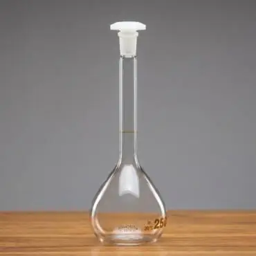 A Class A 250ml clear borosilicate glass volumetric flask with a white polyethylene (PE) stopper and a single graduation mark for precise liquid measurement.