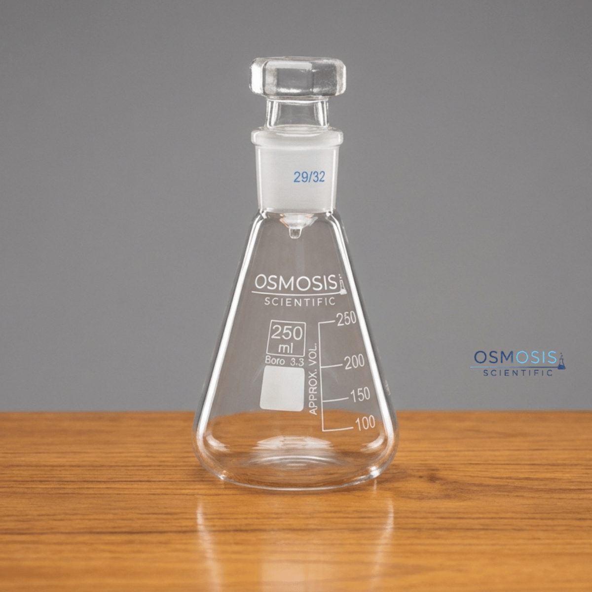 A 250ml clear borosilicate glass Erlenmeyer flask featuring a 24/29 ground glass joint neck and a matching glass stopper for airtight sealing.