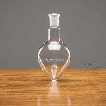 A 100ml clear borosilicate glass pear-shaped flask with a single narrow neck and a 24/29 ground glass joint for laboratory use.