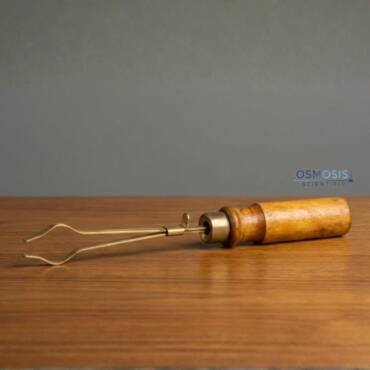 Brass test tube holder with wooden handle for laboratory heating and safe handling