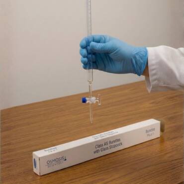 A clear borosilicate glass Class AS burette with a precision glass stopcock and blue linear graduations