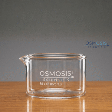 A clear borosilicate glass crystallizing dish with a pouring spout, featuring the "Osmosis Scientific" logo and "80 x 45 Boro 3.3" printed in white on the side.