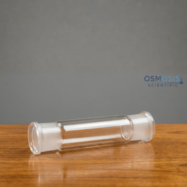 A clear borosilicate glass tube with two precision-ground female socket joints at each end, manufactured to DIN standards.