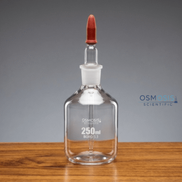 A 250ml clear borosilicate glass dropping bottle with a ground glass stopper featuring an integrated pipette and red rubber bulb for precise liquid dispensing.