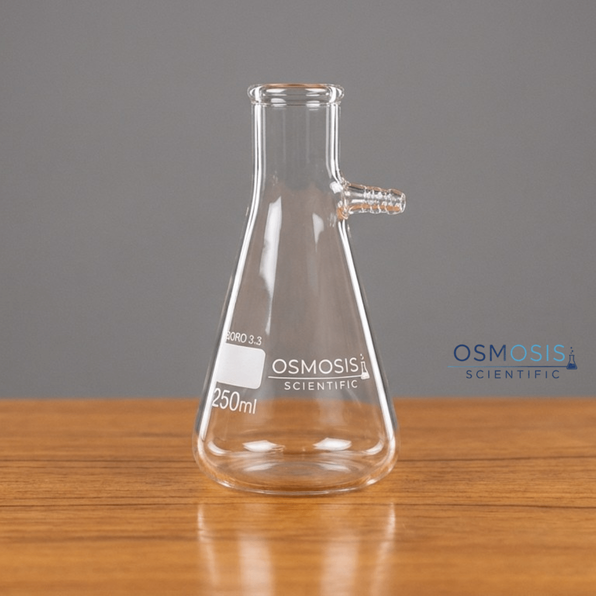 : A 250ml clear borosilicate glass Buchner filtering flask with a side hose barb for vacuum suction.