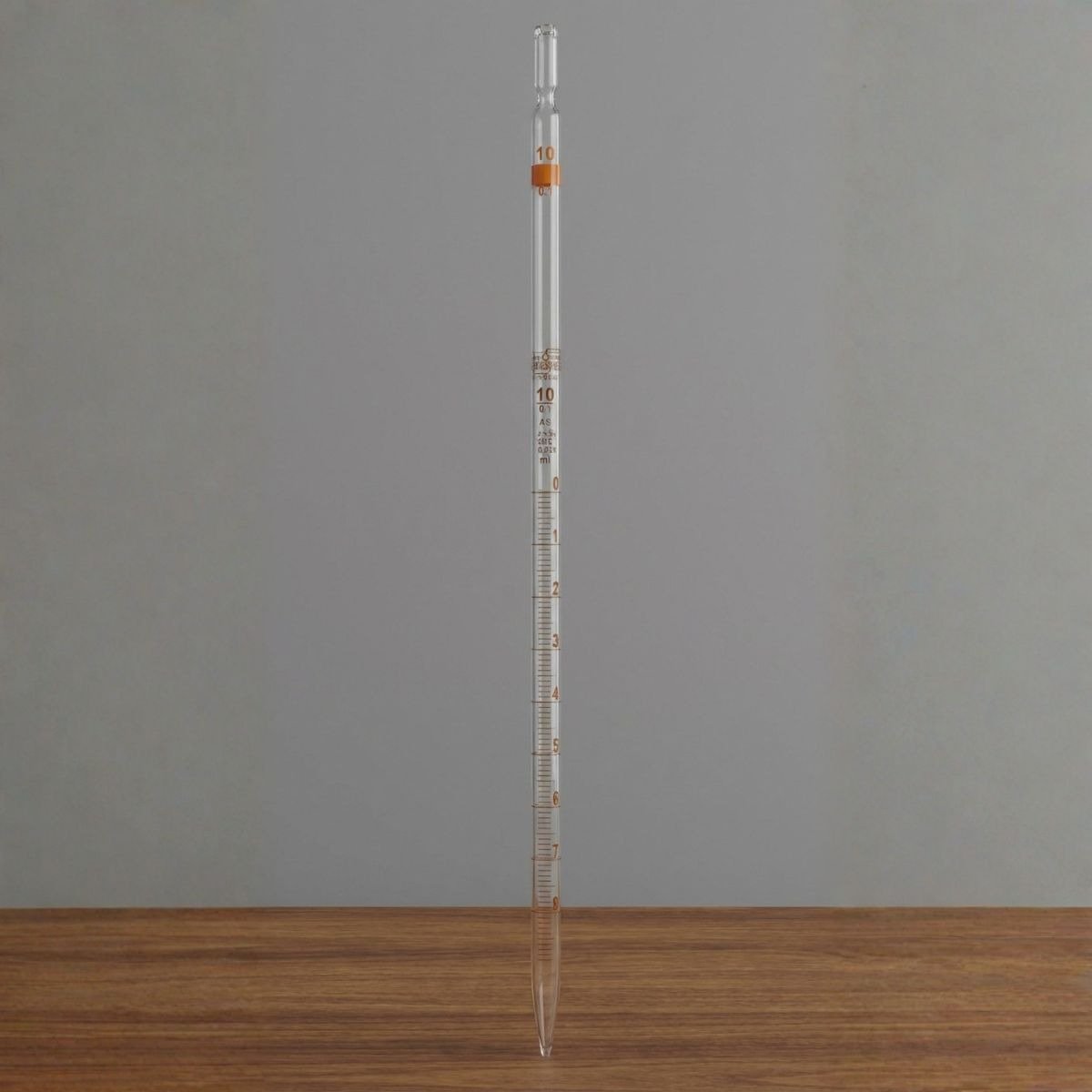 Clear borosilicate glass Class A Mohr graduated pipette with precise brown enamel markings and a uniform bore for accurate liquid measurement.