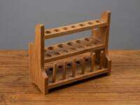 Wooden test tube stand with two-tier design and draining pins for laboratory use