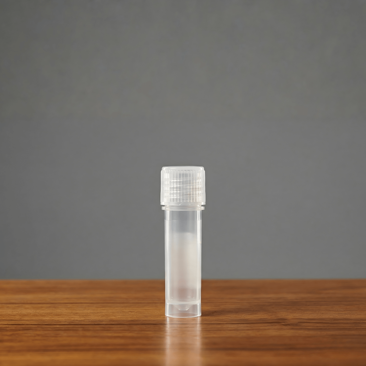 A clear polypropylene test tube with a ribbed screw cap, featuring Osmosis Scientific branding and a white labeling area.