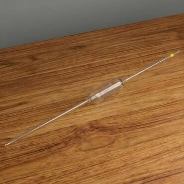 A 100ml clear borosilicate glass volumetric pipette featuring two graduation marks and a central bulb, calibrated to Class AS standards for precise liquid delivery